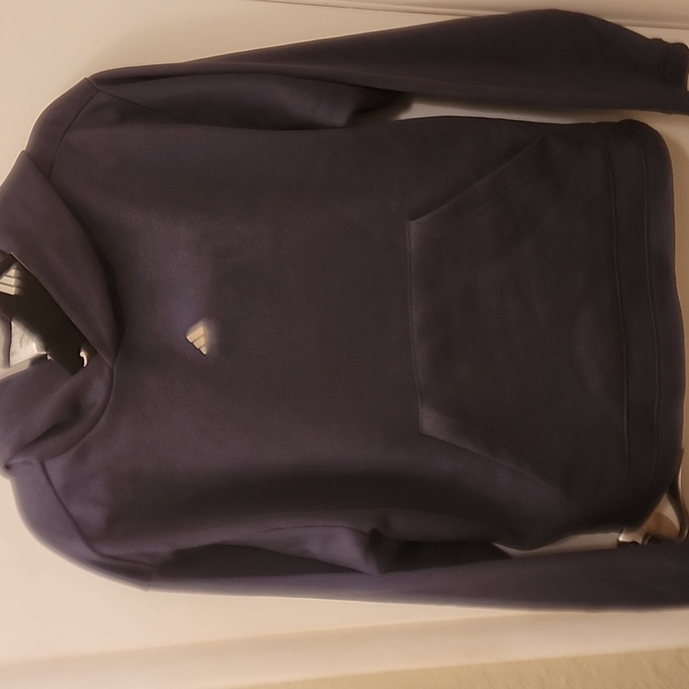 Adidas smooth knit sweatshirt. So soft and comphy! It's a blue grey color.